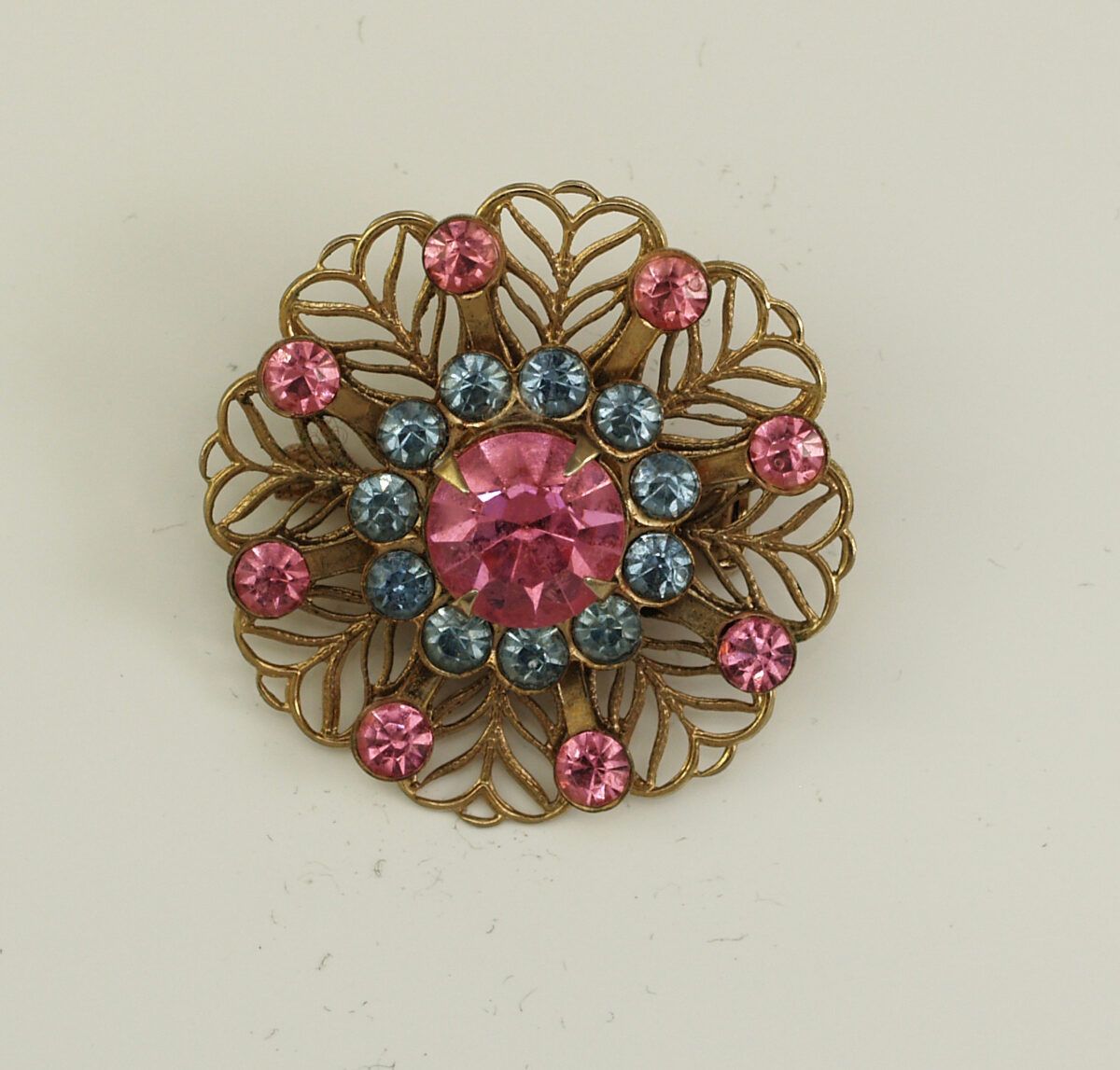 Vintage Blue Topaz and and Pink Rhinestone Open Metalwork PIn