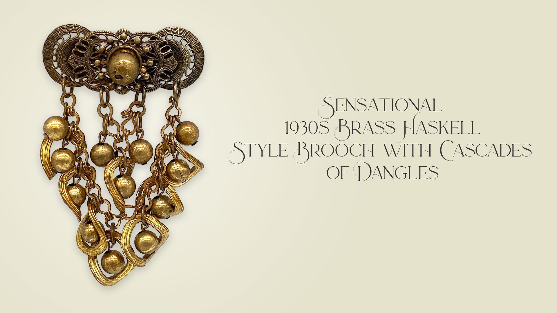 Sensational 1930s brass Haskell Style Brooch with Cascades of Dangles