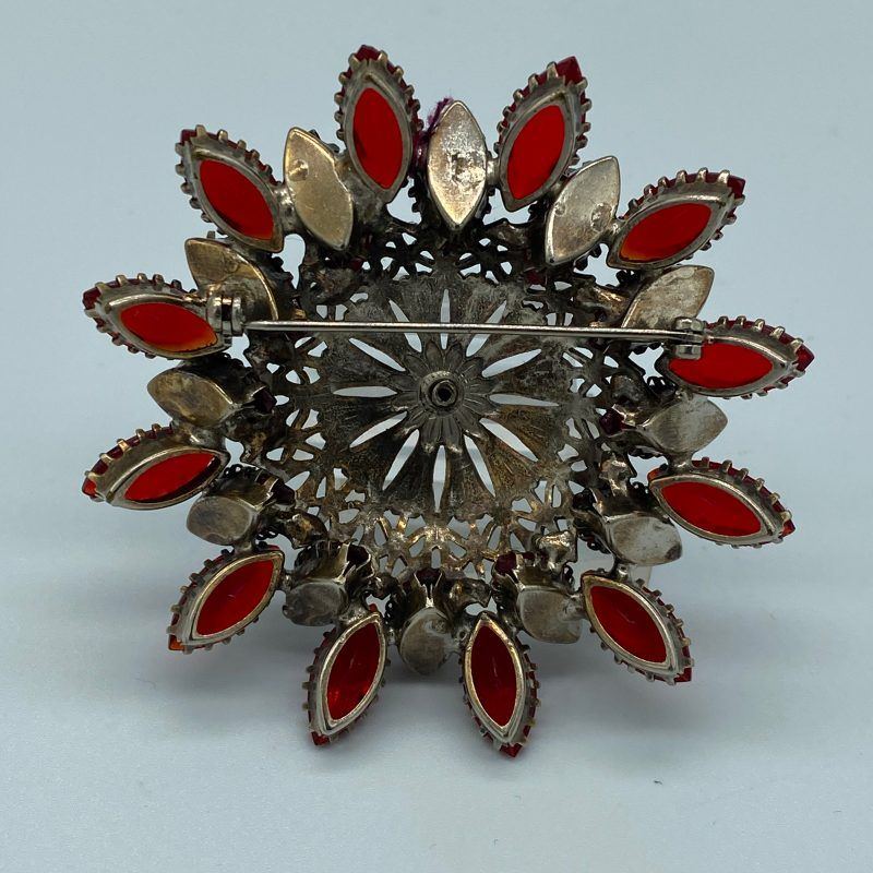 large red rhinestone brooch