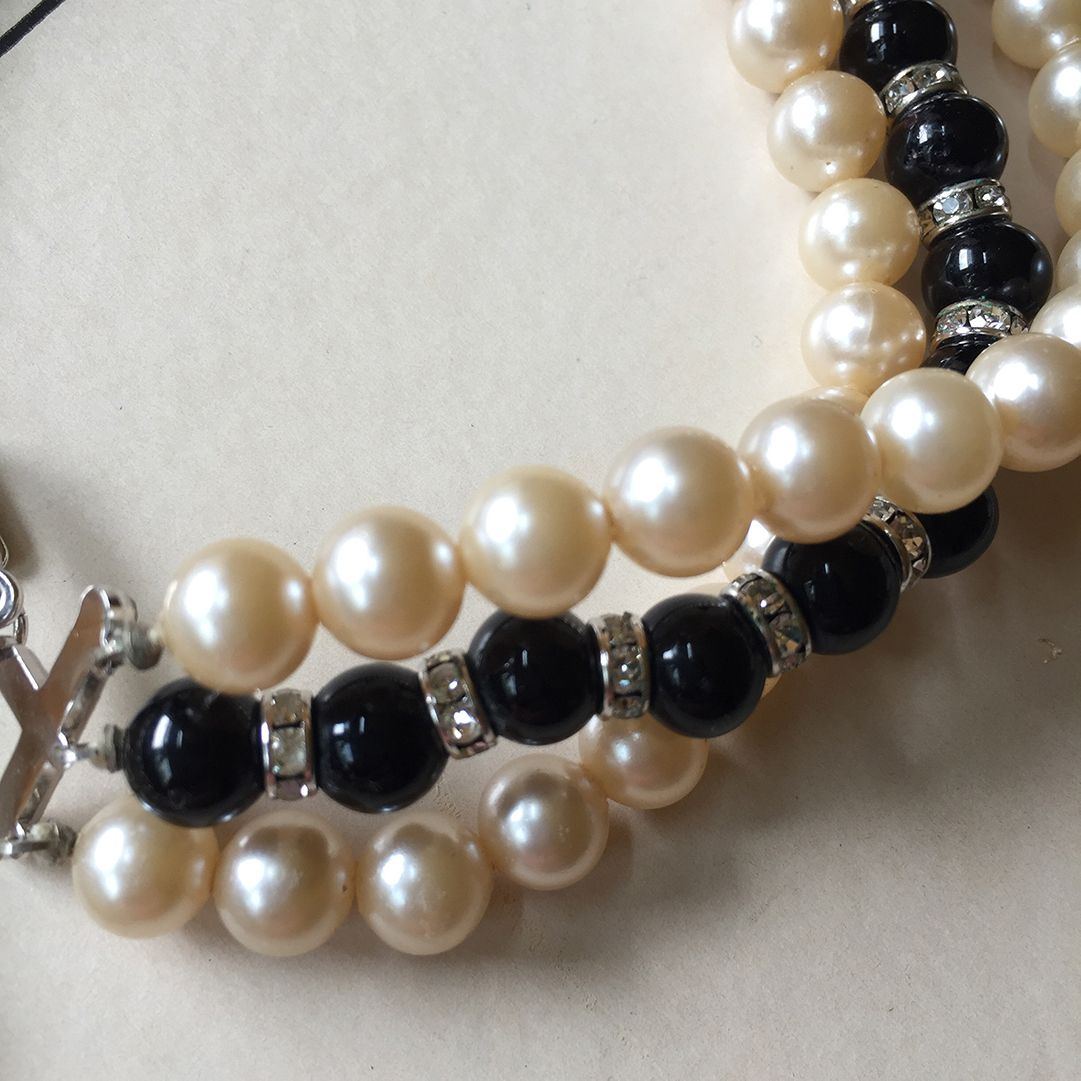 Trifari faux pearl rondell and black bead triple-strand necklace