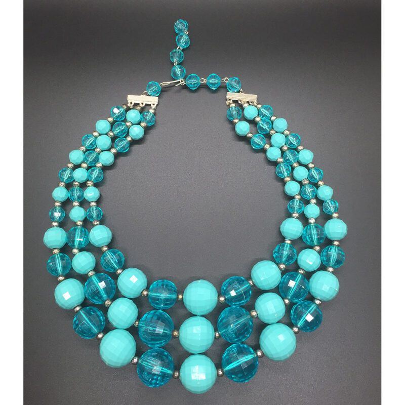 West German hard faceted resin triple-strand necklace