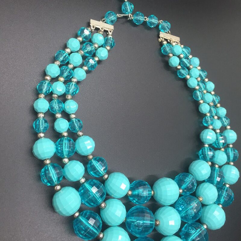 West German hard faceted resin triple-strand necklace