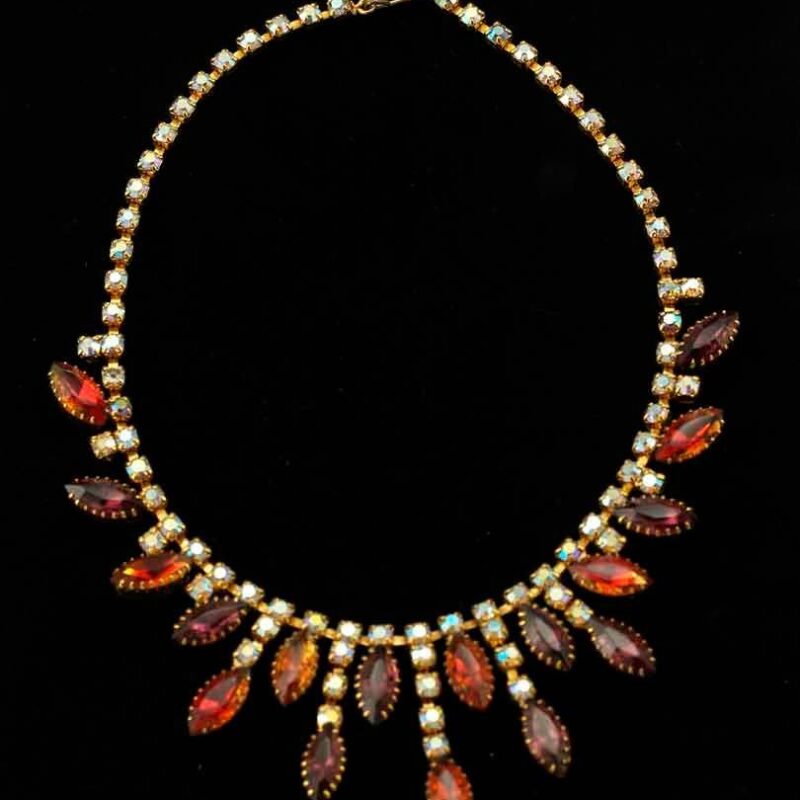 Drippy bib necklace with amazing color palette.