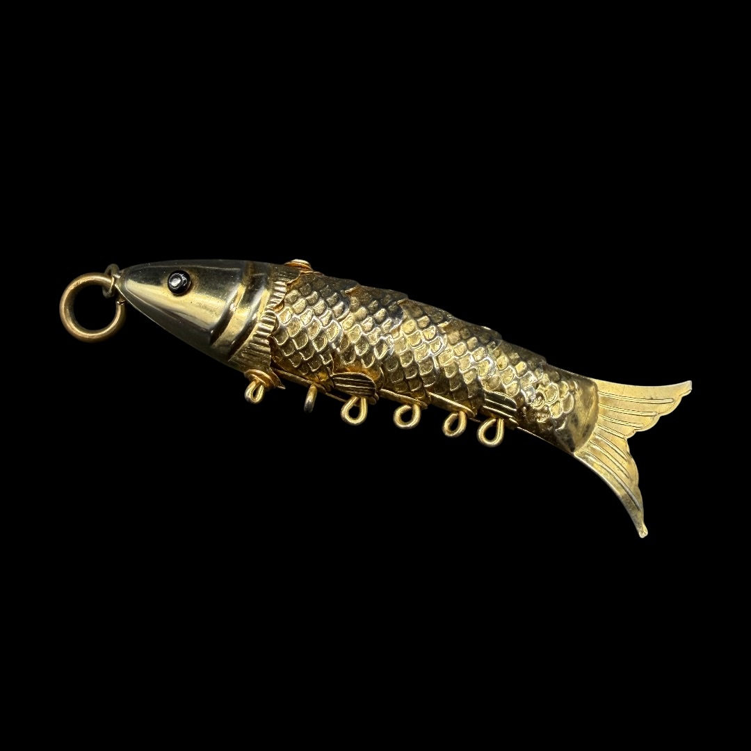 Vintage articulated fish pendant.