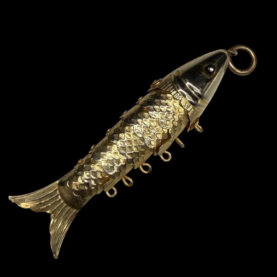 Vintage articulated fish pendant.