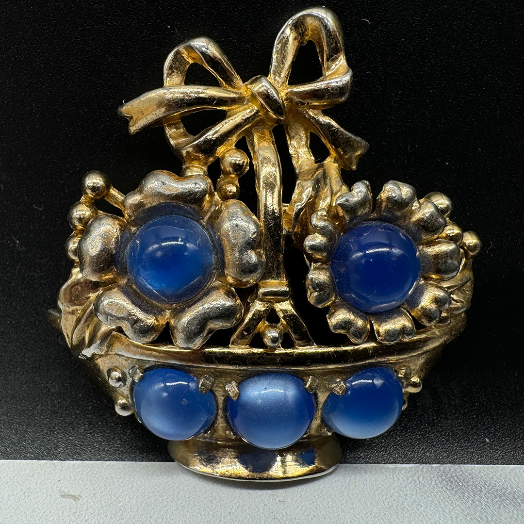 Vintage Coro moon glow basket pin.