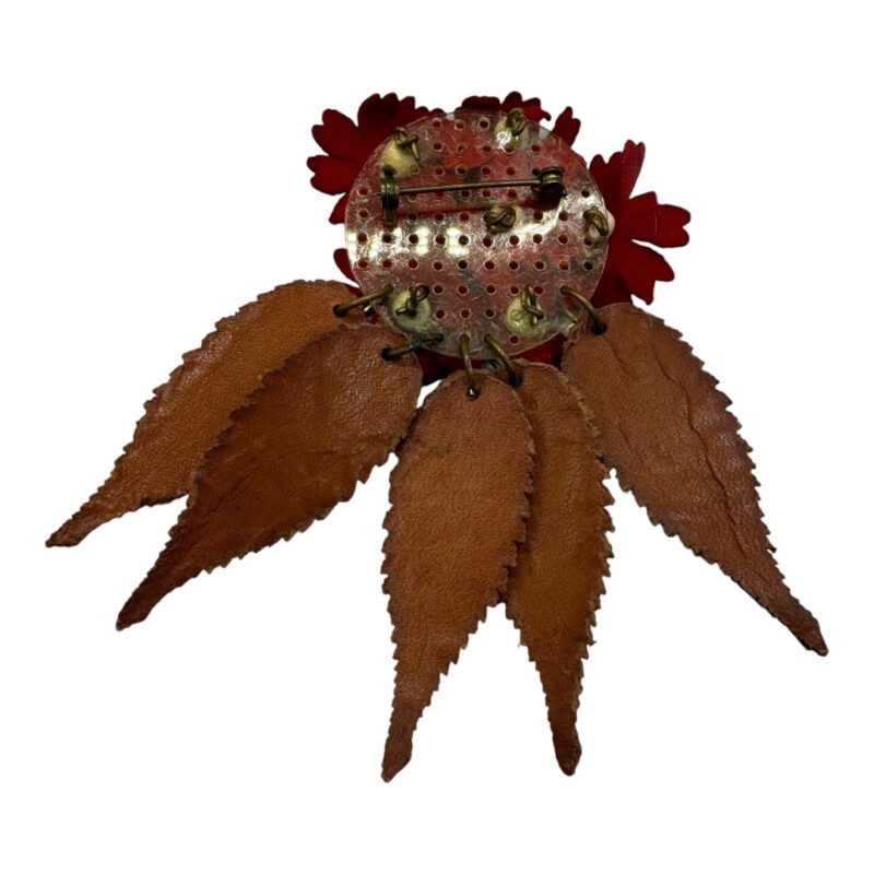 Miriam Haskell leather pin front.