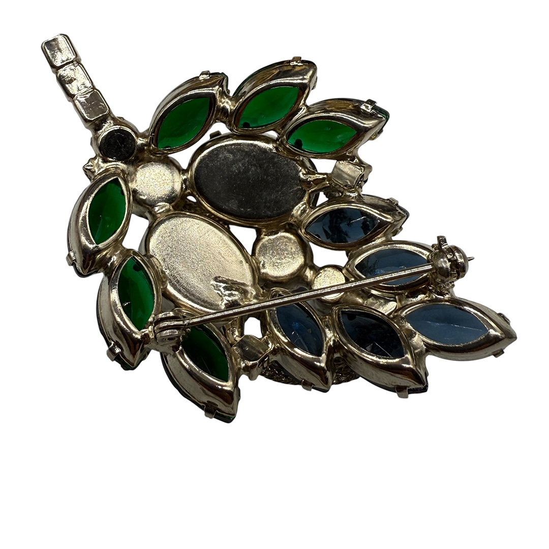 Fabulous green blue rhinestone brooch back.