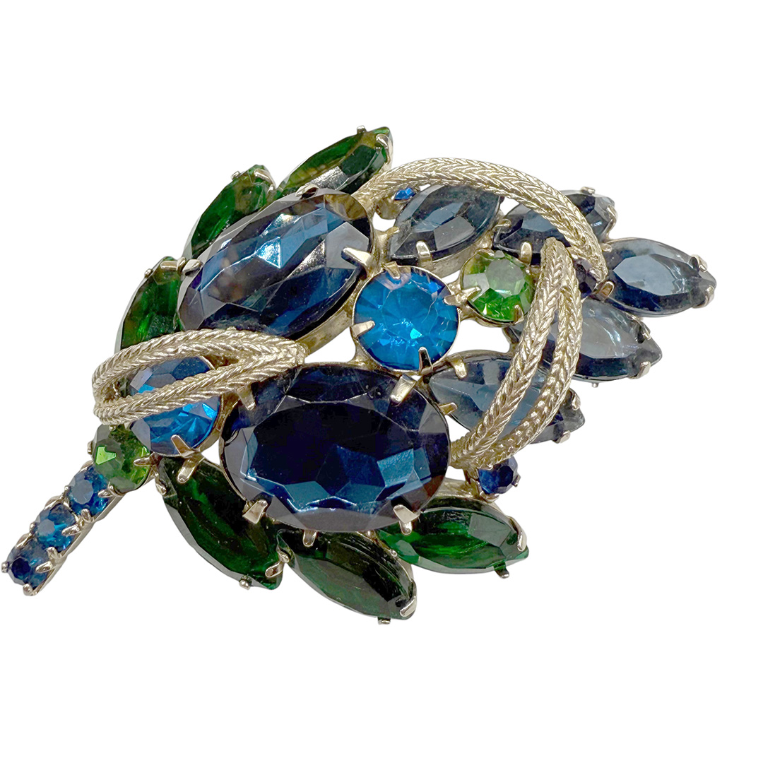 Fabulous green blue rhinestone brooch.