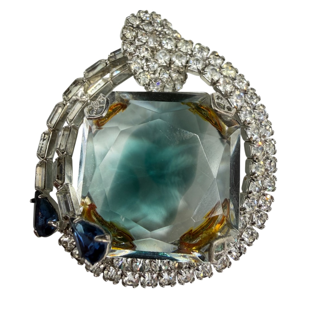 Large givre rhinestone brooch.