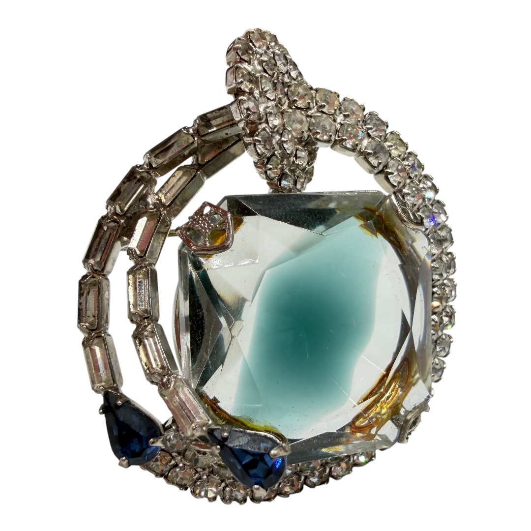 Large givre rhinestone brooch.