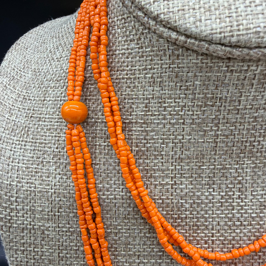 Vintage coral-color seed bead necklace.