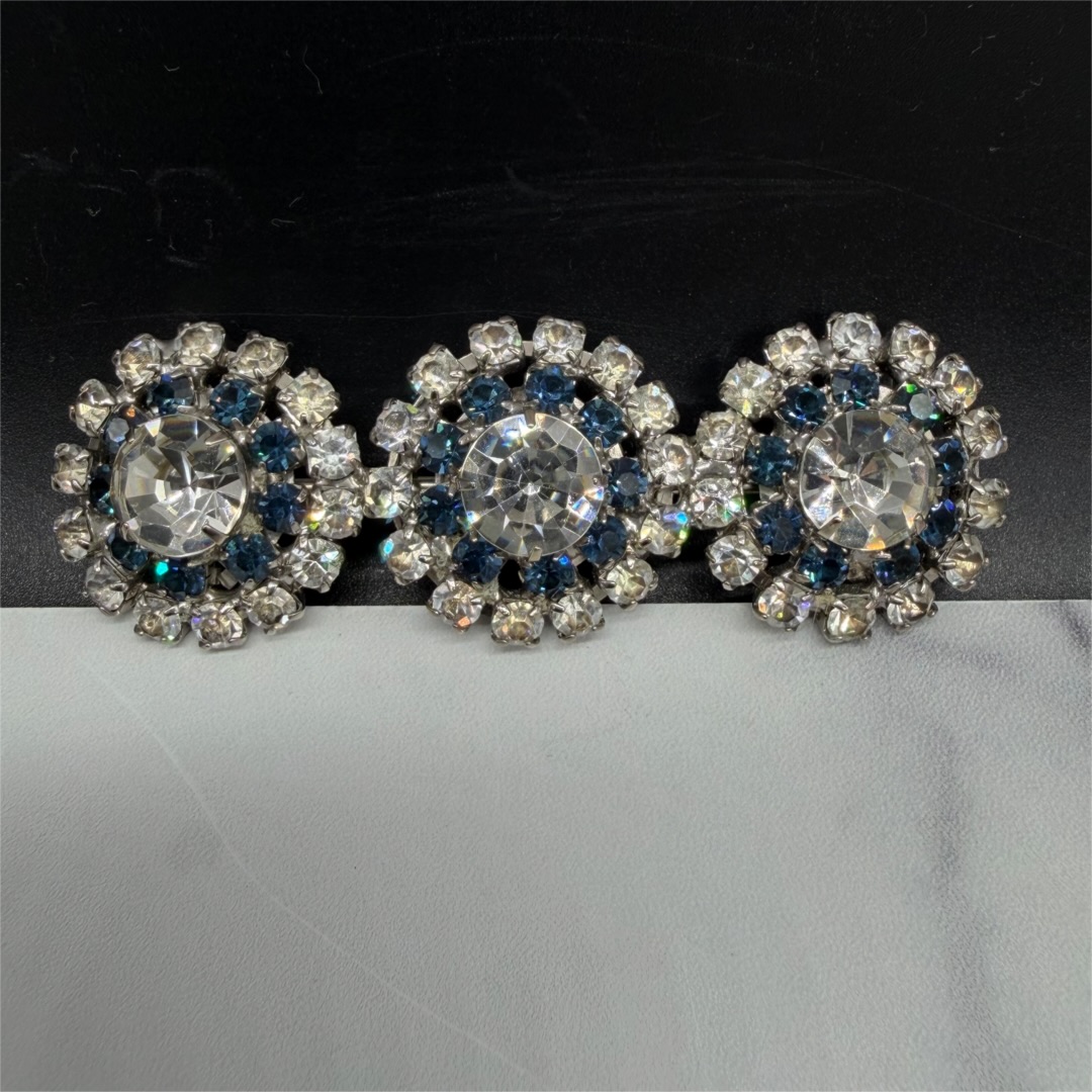 Blue and clear rhinestone ornament.