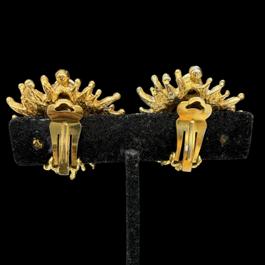 Vintage sculptural earrings backs.